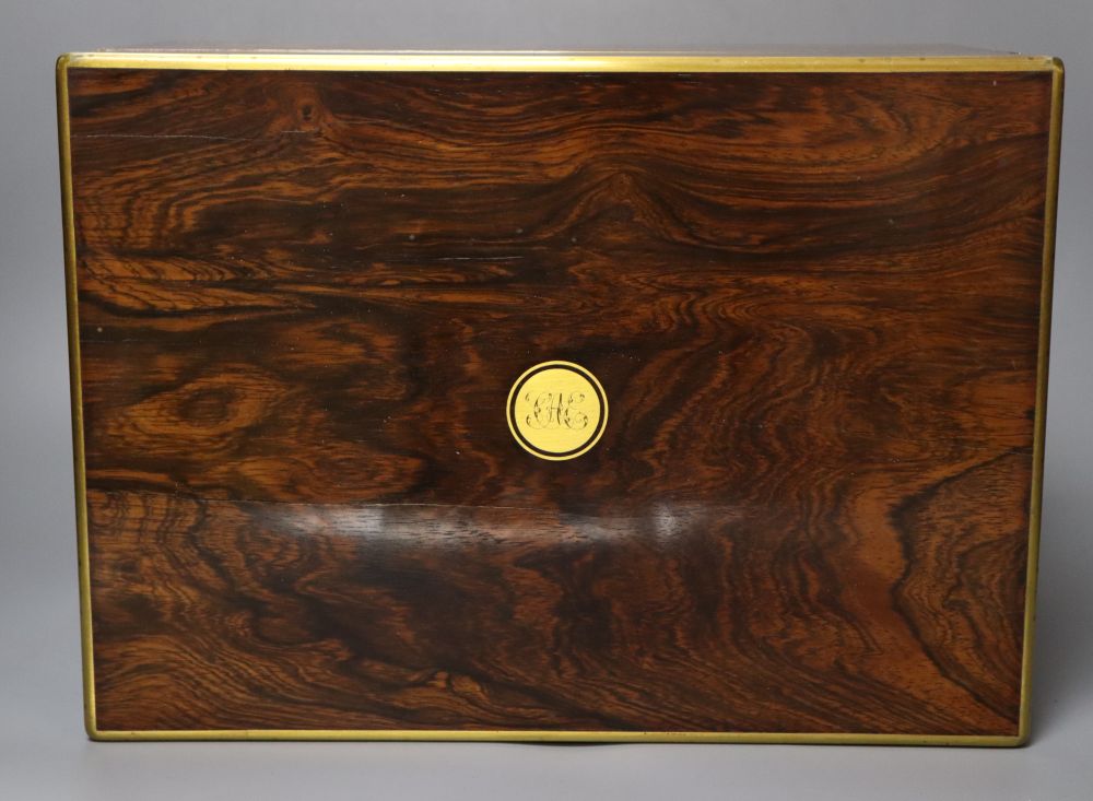 A Regency brass mounted rosewood toilet box, with glass contents and base drawer, width 36cm